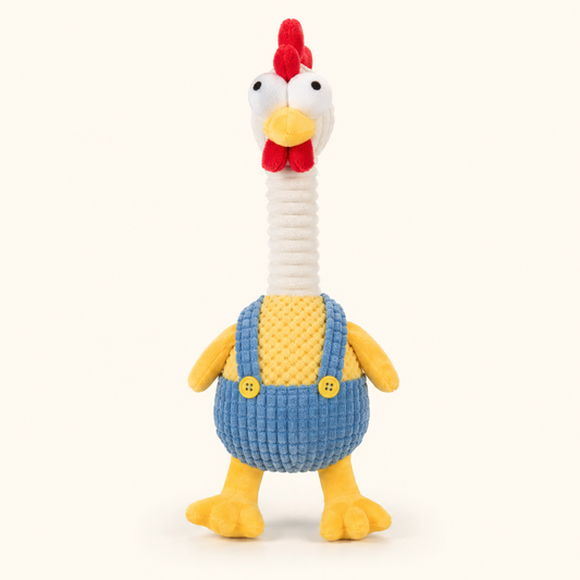 Long-neck plush chicken squeaky dog toy in blue overalls on cream background