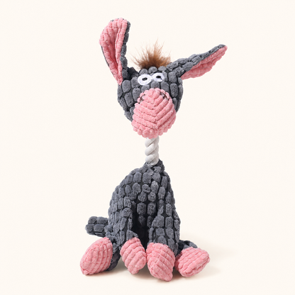 Grey donkey corduroy squeaky dog toy on cream background