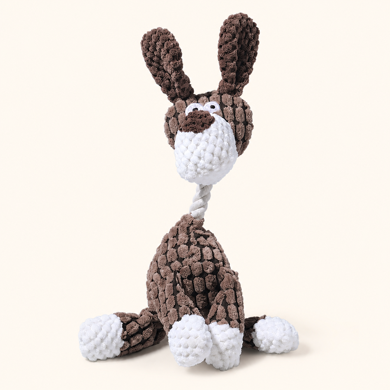 Long-ear dog corduroy squeaky dog toy on cream background